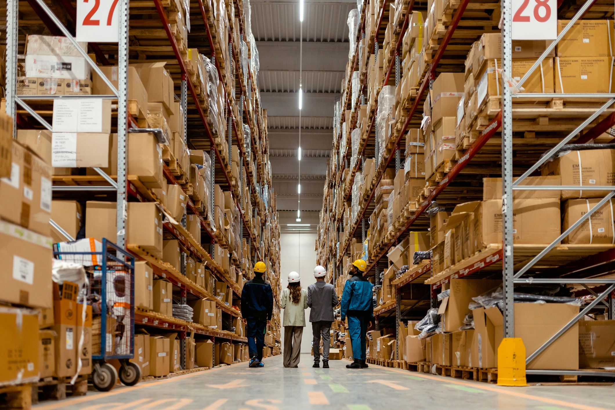 Logistics team walking through a warehouse